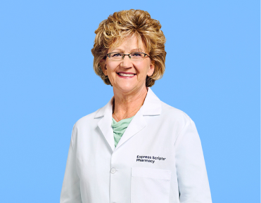 A smiling pharmacist