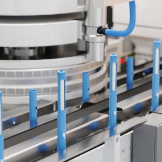 compounded semaglutide on a conveyor belt